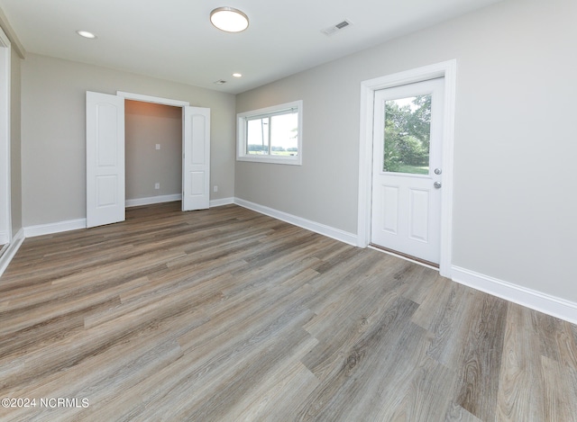 unfurnished bedroom with light hardwood / wood-style flooring