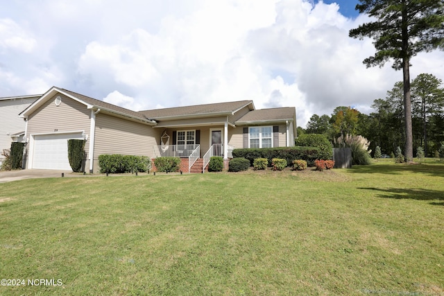 ranch-style home featuring a porch, a garage, and a front yard