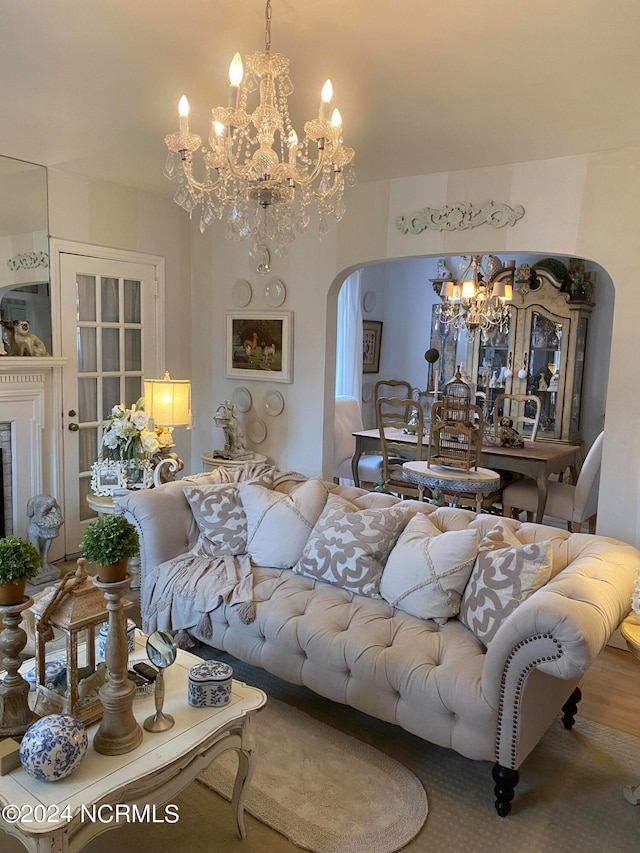 living room featuring a notable chandelier