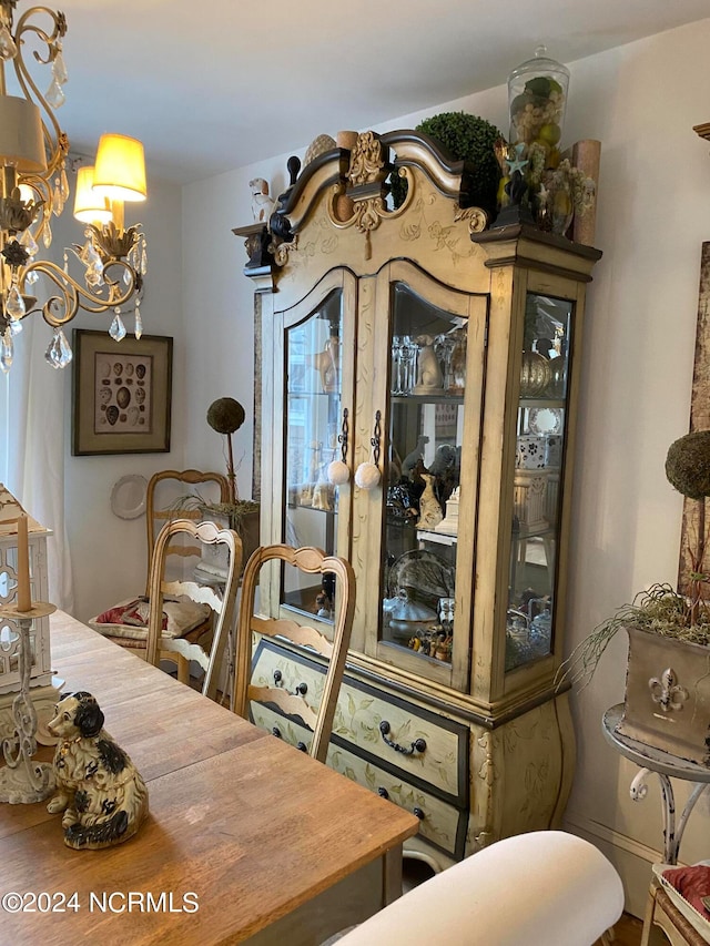 dining area with a chandelier