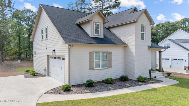 view of side of home with a garage