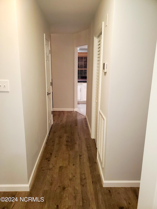 hall featuring dark hardwood / wood-style floors