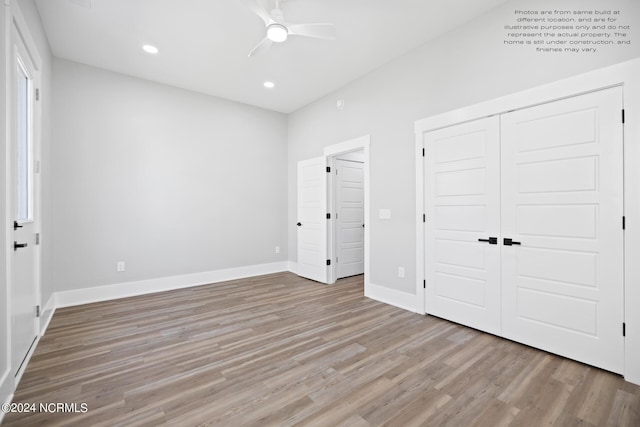 unfurnished bedroom with a closet, light wood-type flooring, and ceiling fan