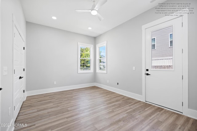 unfurnished room with ceiling fan and light hardwood / wood-style flooring