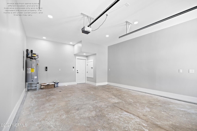 garage with a garage door opener and electric water heater