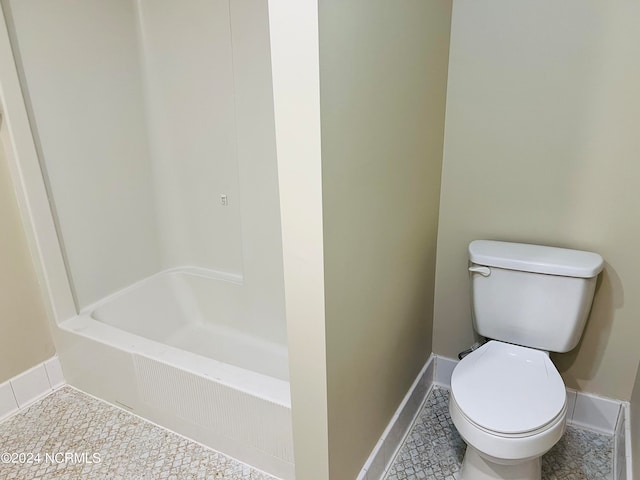 bathroom featuring tile patterned floors and toilet