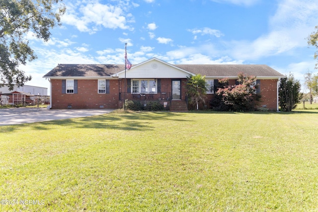 ranch-style house with a front yard