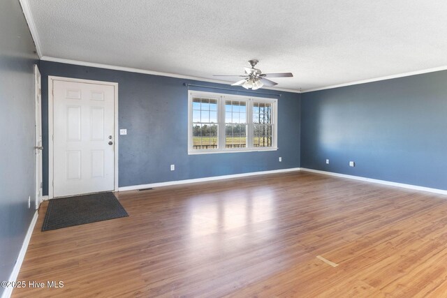 sunroom with ceiling fan and washing machine and clothes dryer