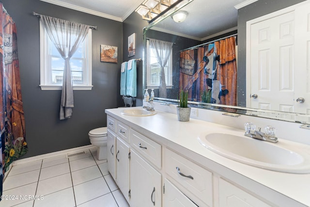 bathroom featuring tile patterned floors, vanity, toilet, and ornamental molding