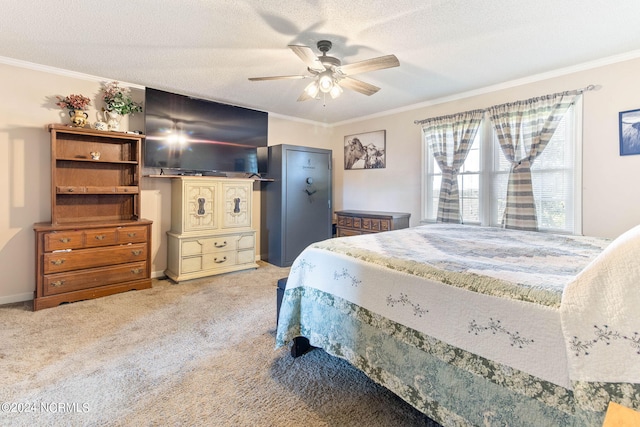 carpeted bedroom featuring ceiling fan, crown molding, and a textured ceiling