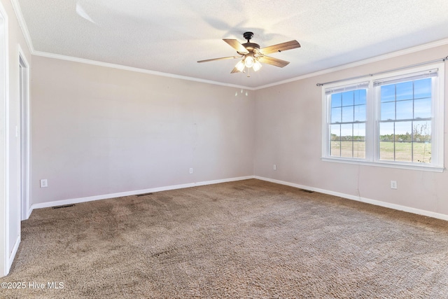 unfurnished room featuring a textured ceiling, ceiling fan, carpet floors, baseboards, and ornamental molding