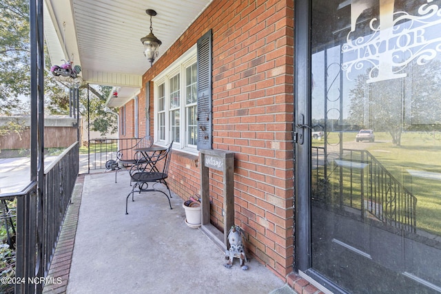 view of patio featuring a porch