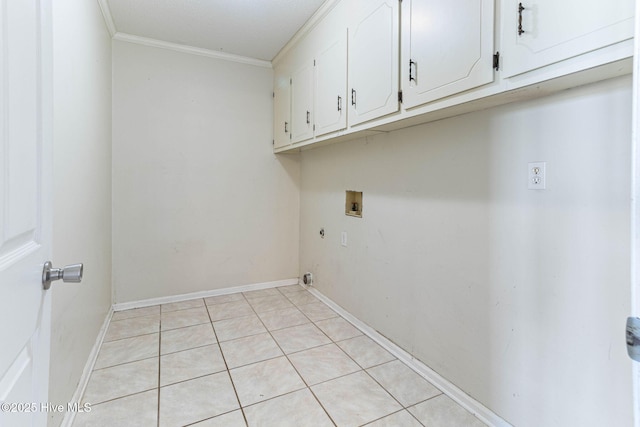 clothes washing area featuring hookup for a washing machine, hookup for an electric dryer, baseboards, cabinet space, and crown molding