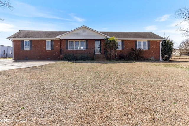 ranch-style home featuring crawl space, a front yard, and brick siding