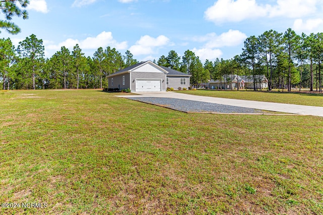 view of yard with a garage