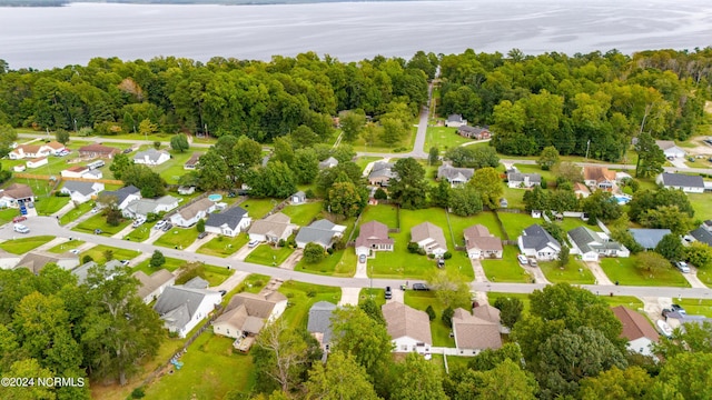 bird's eye view featuring a residential view and a water view