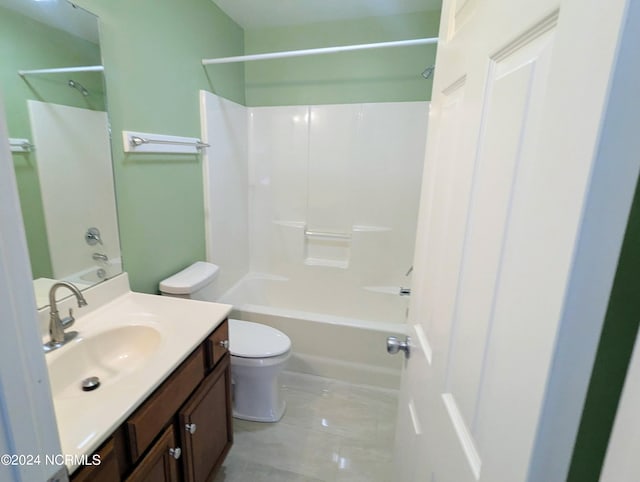 full bathroom featuring shower / bathtub combination, vanity, and toilet