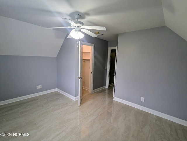 bonus room featuring lofted ceiling and ceiling fan