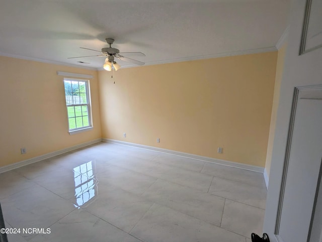 unfurnished room featuring ornamental molding and ceiling fan