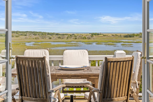 exterior space with a water view