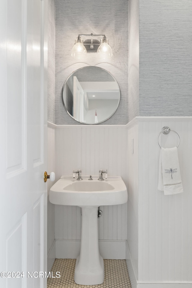 bathroom with tile patterned floors