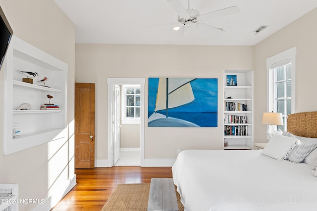 bedroom featuring ceiling fan and hardwood / wood-style floors