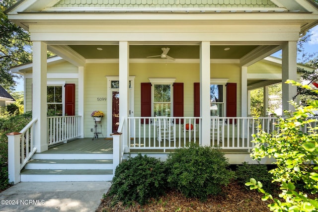 property entrance featuring a porch and ceiling fan