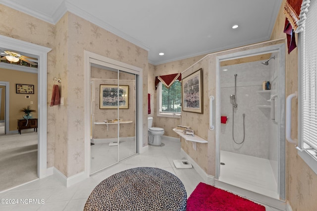 bathroom with ornamental molding, tile patterned flooring, a shower with door, and toilet