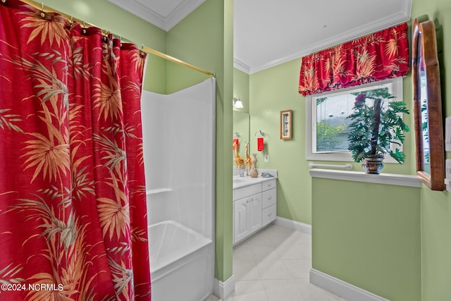 full bath featuring tile patterned flooring, vanity, crown molding, and baseboards