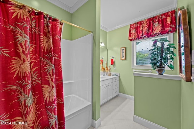 bathroom with tile patterned flooring, vanity, crown molding, and baseboards