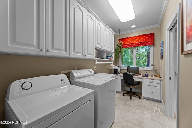 washroom with ornamental molding, washer and clothes dryer, cabinet space, and visible vents