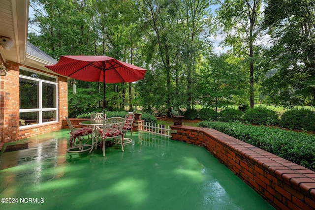 view of patio with outdoor dining space