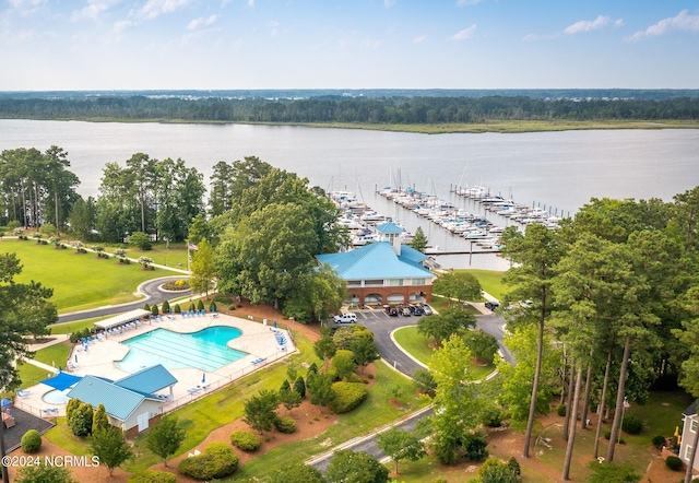 birds eye view of property with a water view