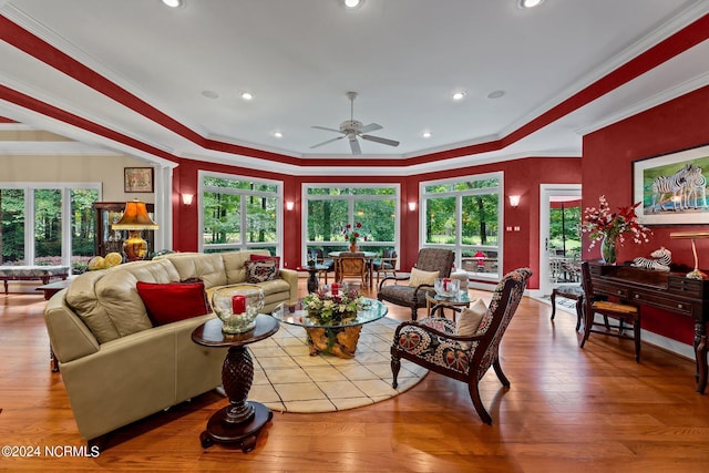 living area featuring ornamental molding, recessed lighting, a ceiling fan, and wood-type flooring
