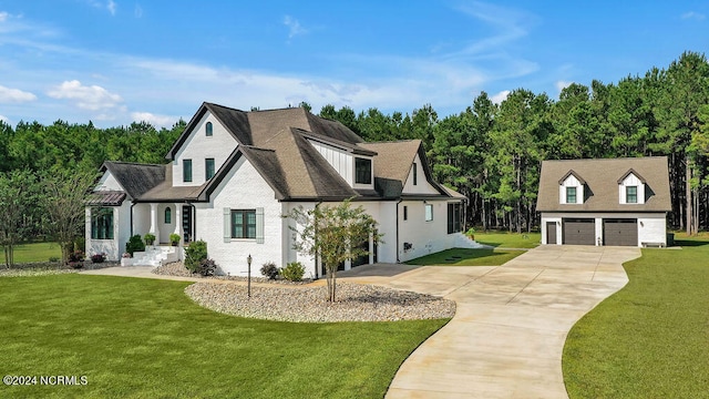 view of front facade featuring a front lawn and a garage