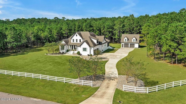 79 Bishop Branch Ln SE, Leland, NC 28451 - aerial view of property and surrounding area featuring a heavily wooded area