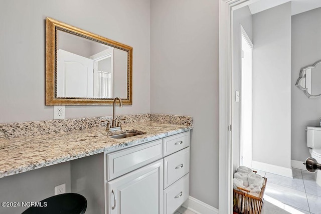 79 Bishop Branch Ln SE, Leland, NC 28451 - bathroom with toilet, vanity, and baseboards