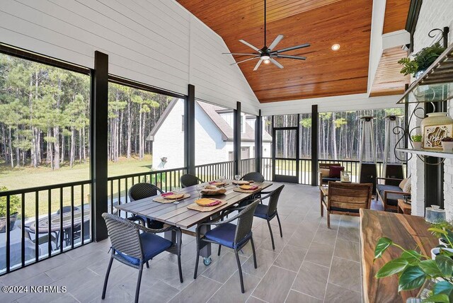 79 Bishop Branch Ln SE, Leland, NC 28451 - sunroom featuring lofted ceiling, ceiling fan, and outdoor dining area