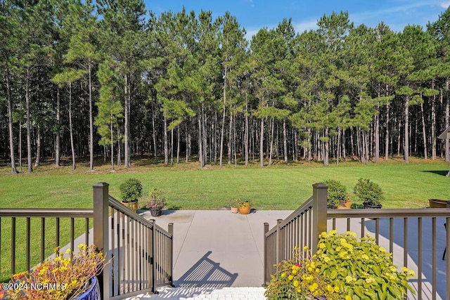 79 Bishop Branch Ln SE, Leland, NC 28451 - deck featuring a lawn