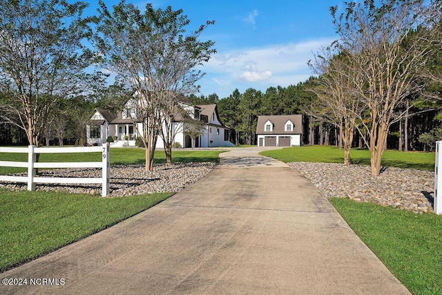 79 Bishop Branch Ln SE, Leland, NC 28451 - view of front of house featuring driveway and a front yard