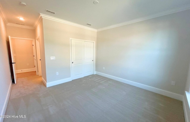 unfurnished bedroom featuring crown molding