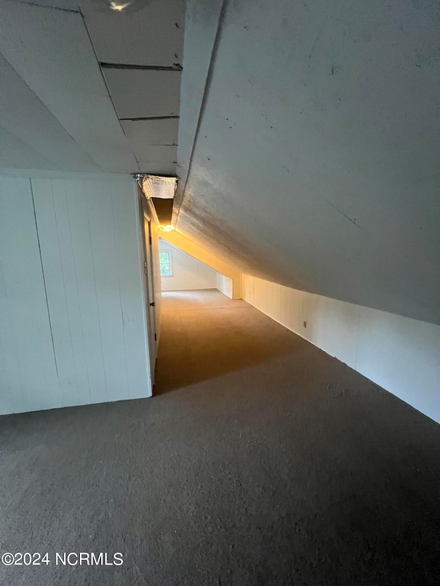 bonus room featuring lofted ceiling