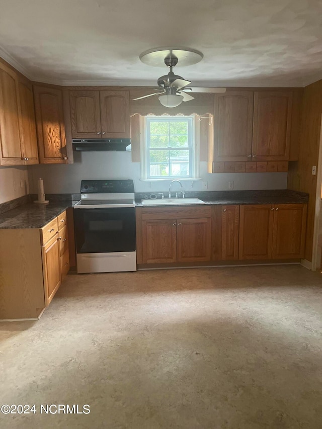 kitchen with ceiling fan, sink, and range