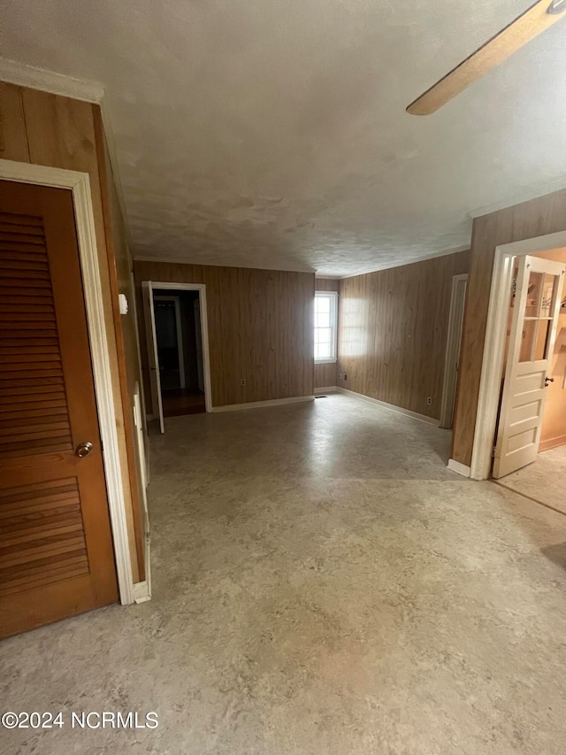 additional living space with wood walls