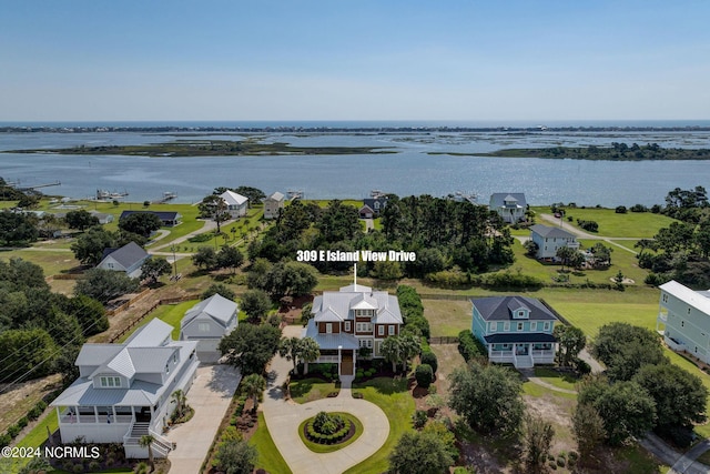 drone / aerial view with a water view