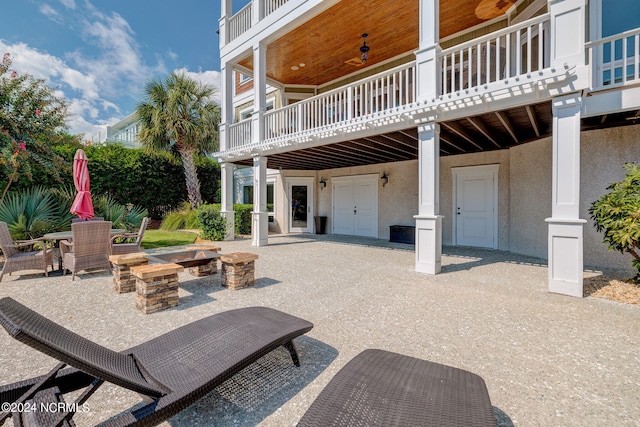 view of patio featuring ceiling fan