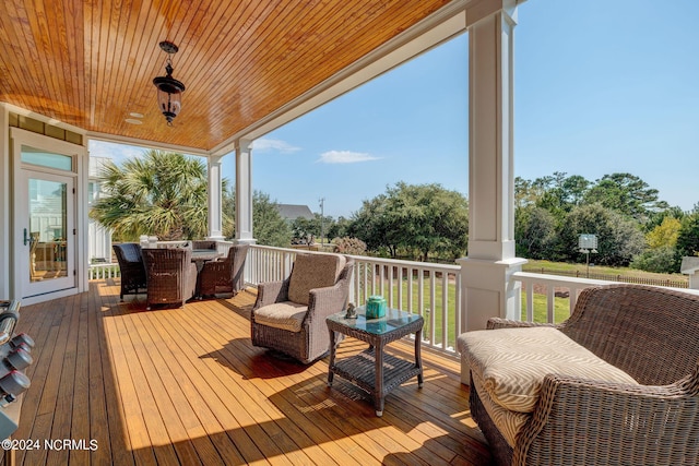 deck with outdoor dining space