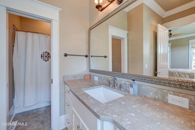 bathroom featuring ceiling fan, a shower with curtain, vanity, and ornamental molding