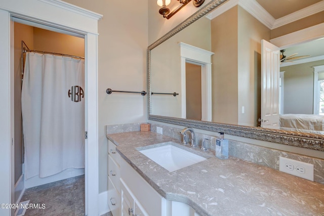 full bath with vanity, ceiling fan, and crown molding