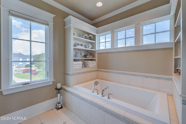 bathroom with tile patterned flooring, tiled tub, and crown molding